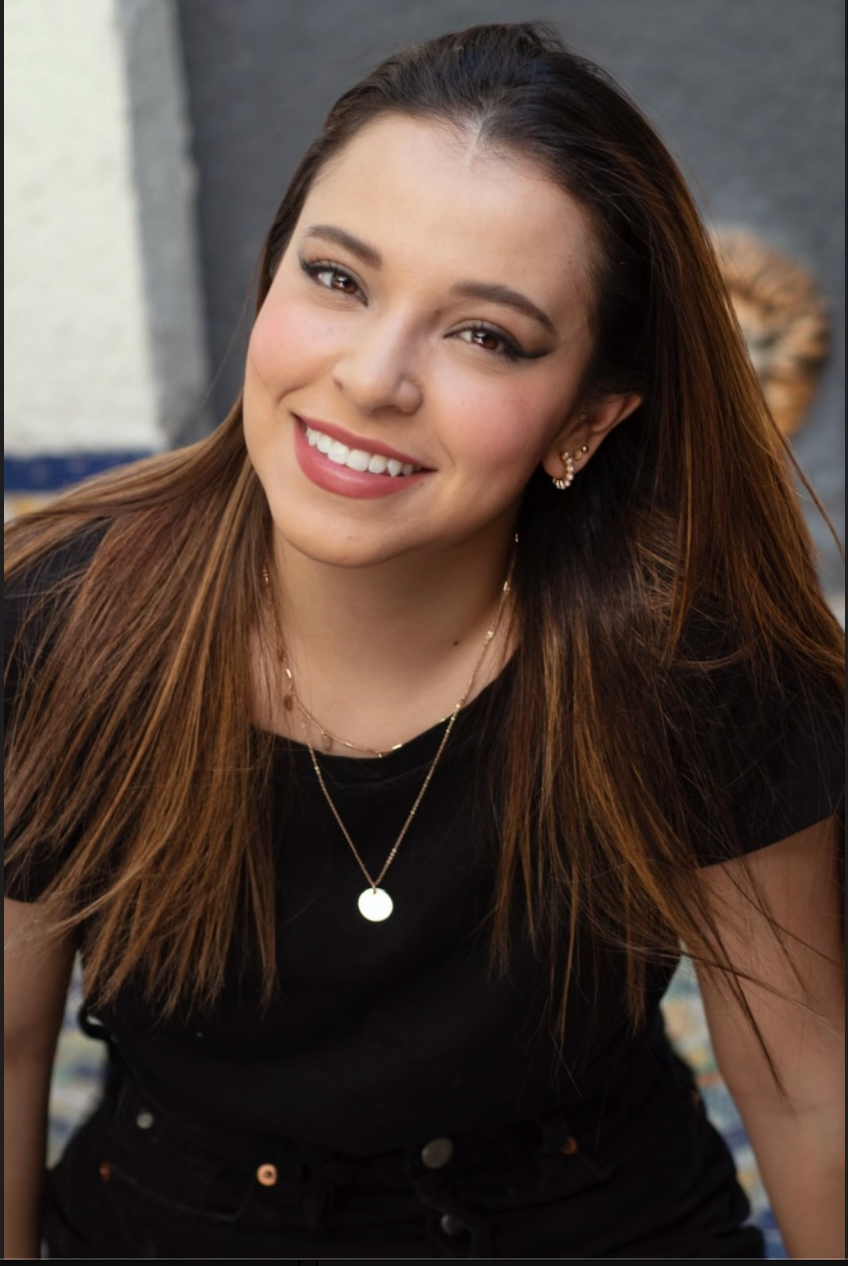 a person smiling at the camera