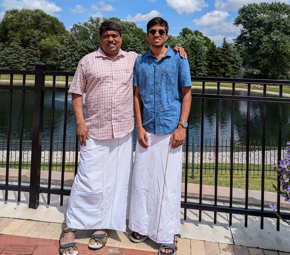 two men standing next to each other