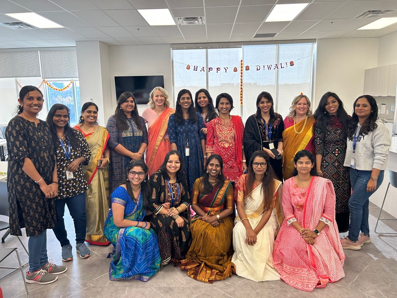 a group of women posing for a photo