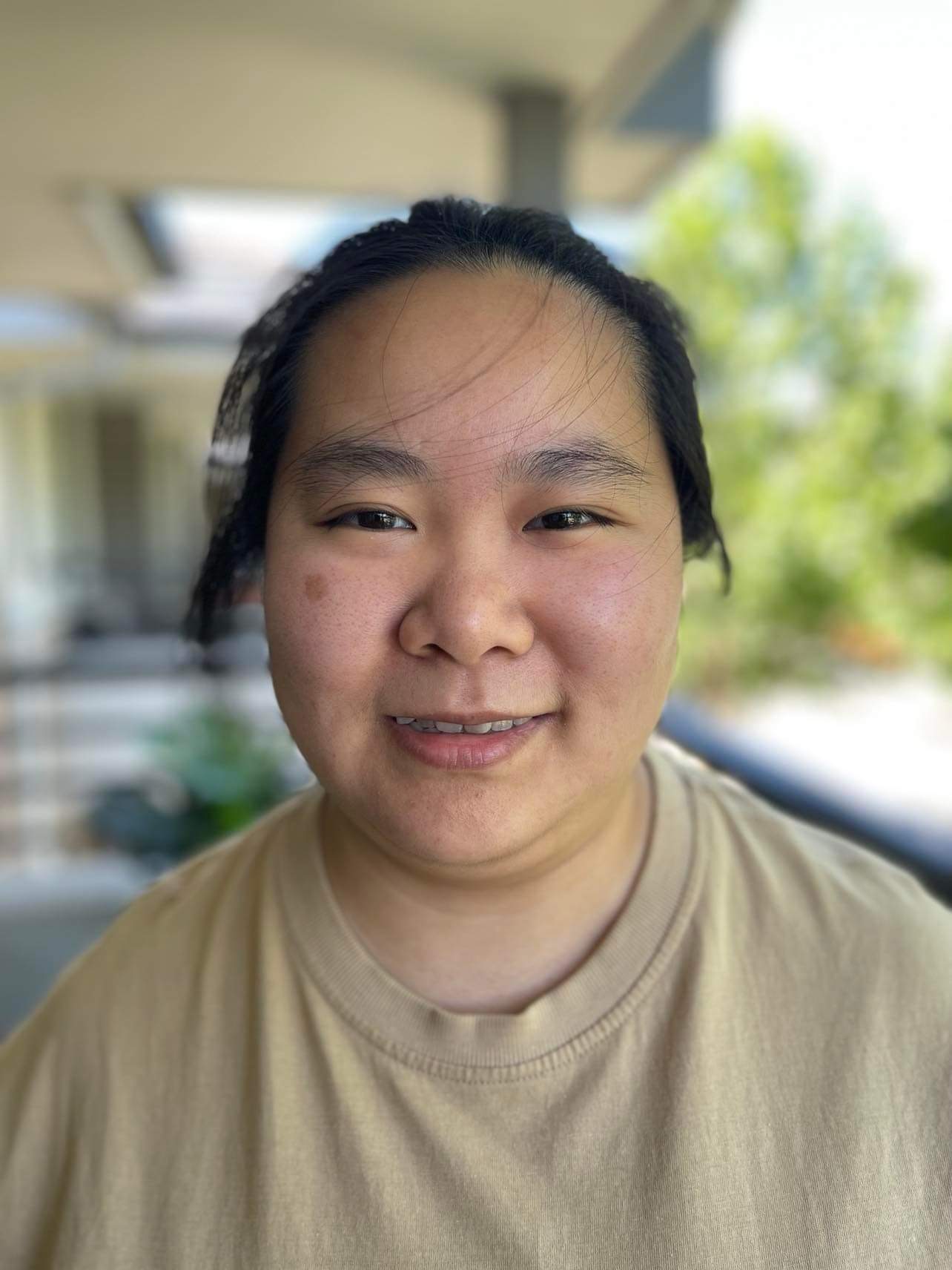 a person smiling for a selfie