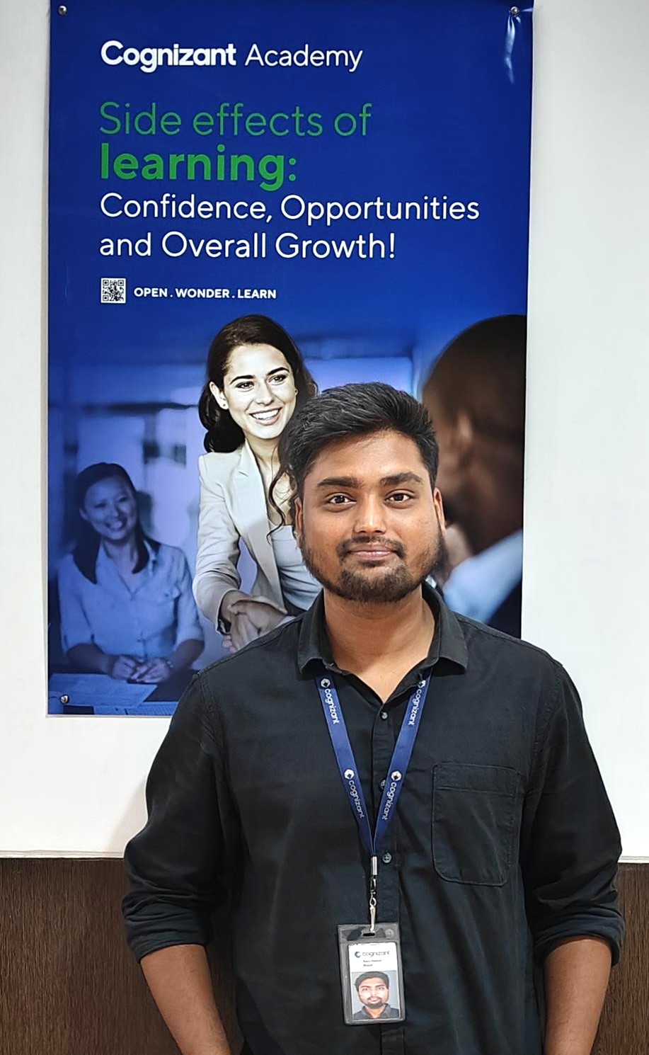a person standing in front of a poster