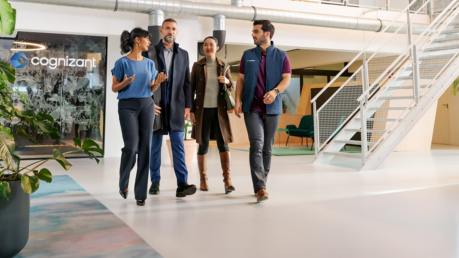 a group of people walking in a hallway