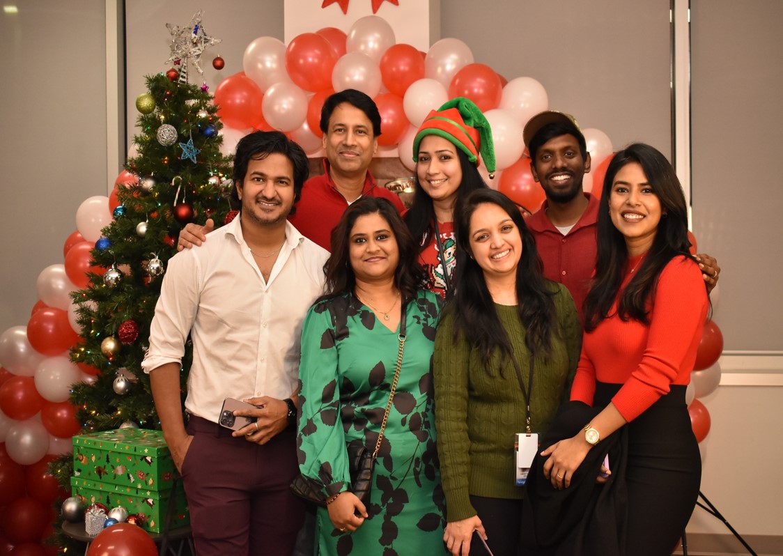 a group of people posing for a photo