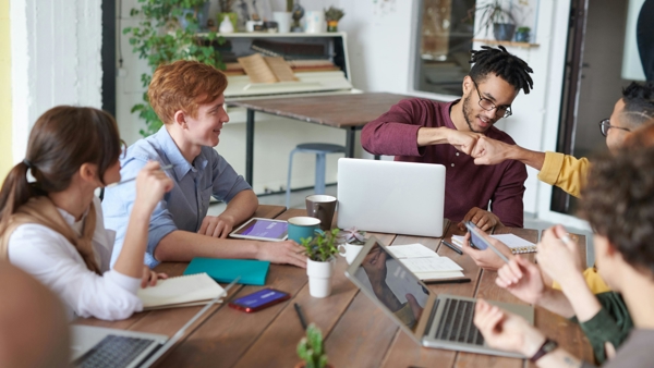 a group of people around a table