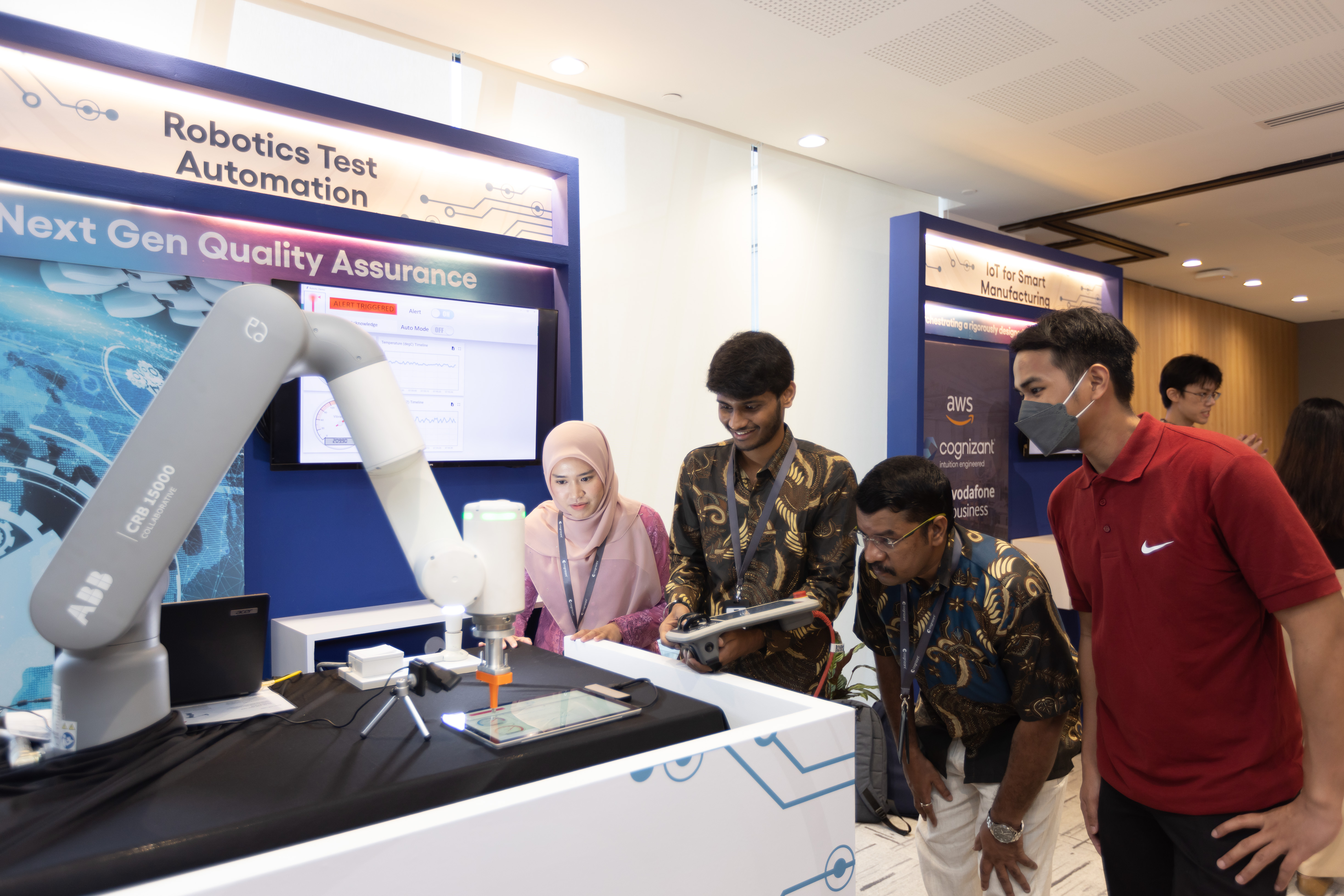 a group of people standing next to a machine