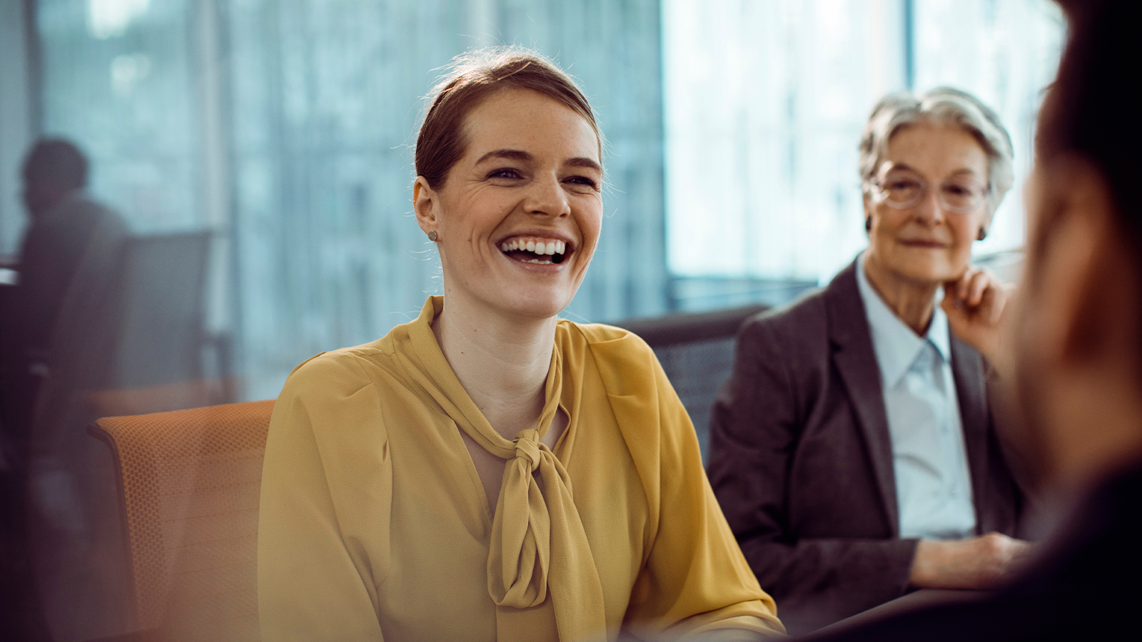 a person laughing in a room