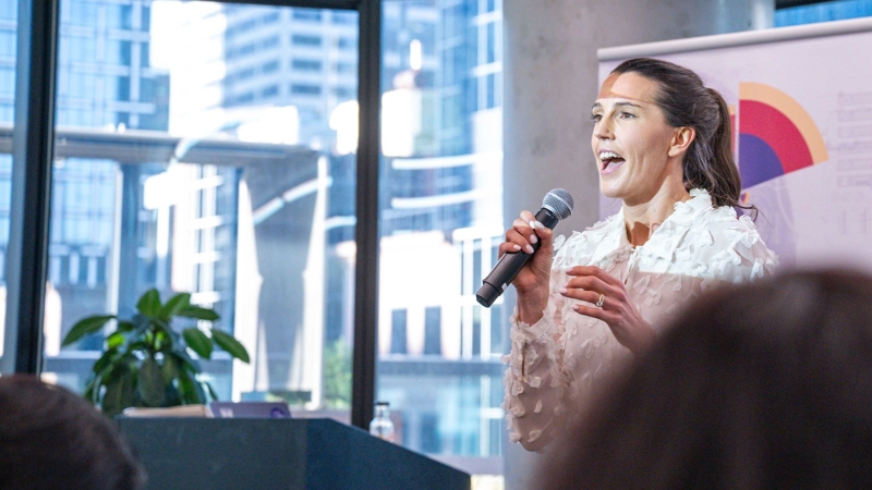 a person speaking into a microphone