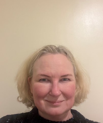 a person smiling for the camera