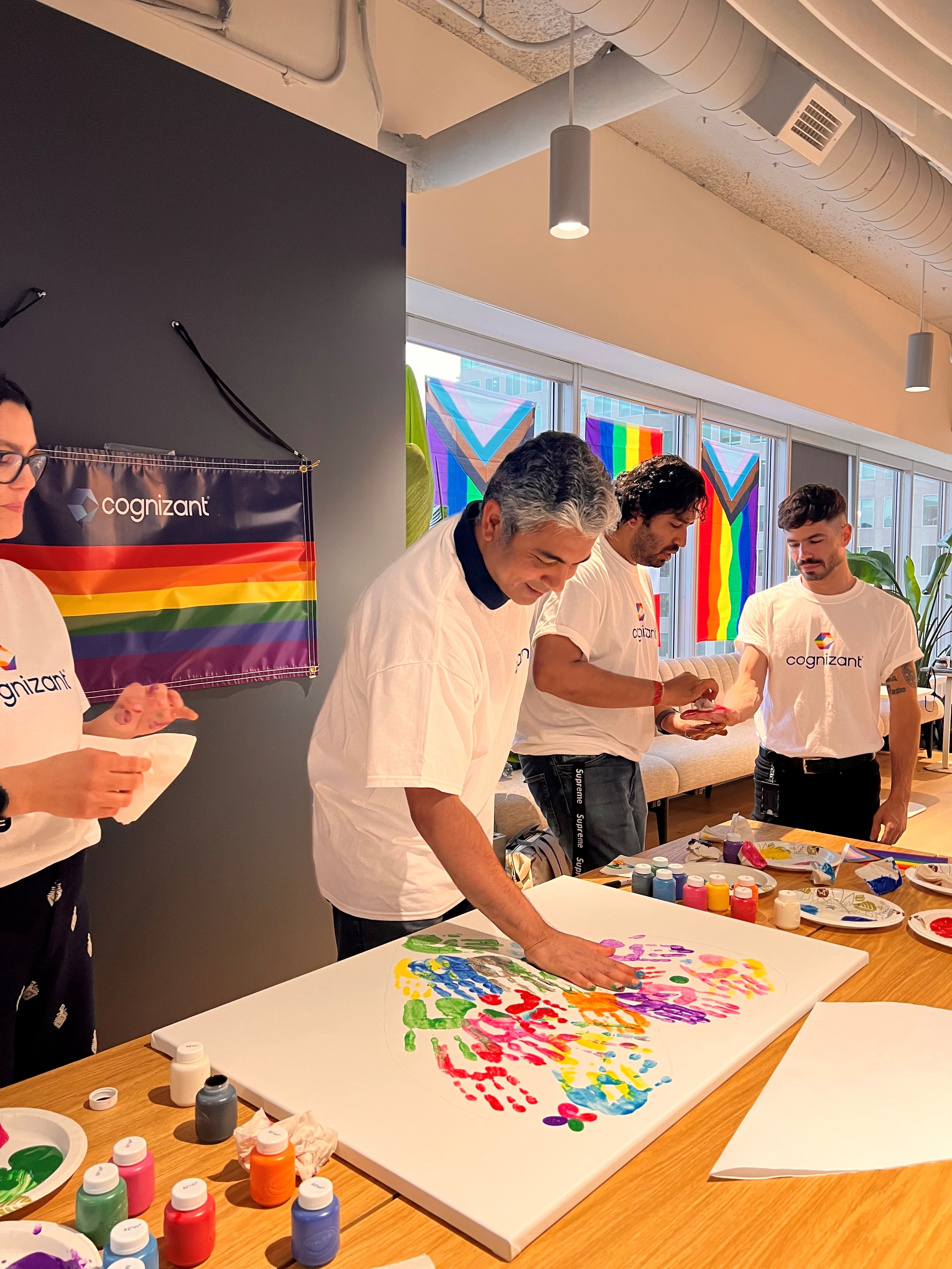 a group of people painting on a table