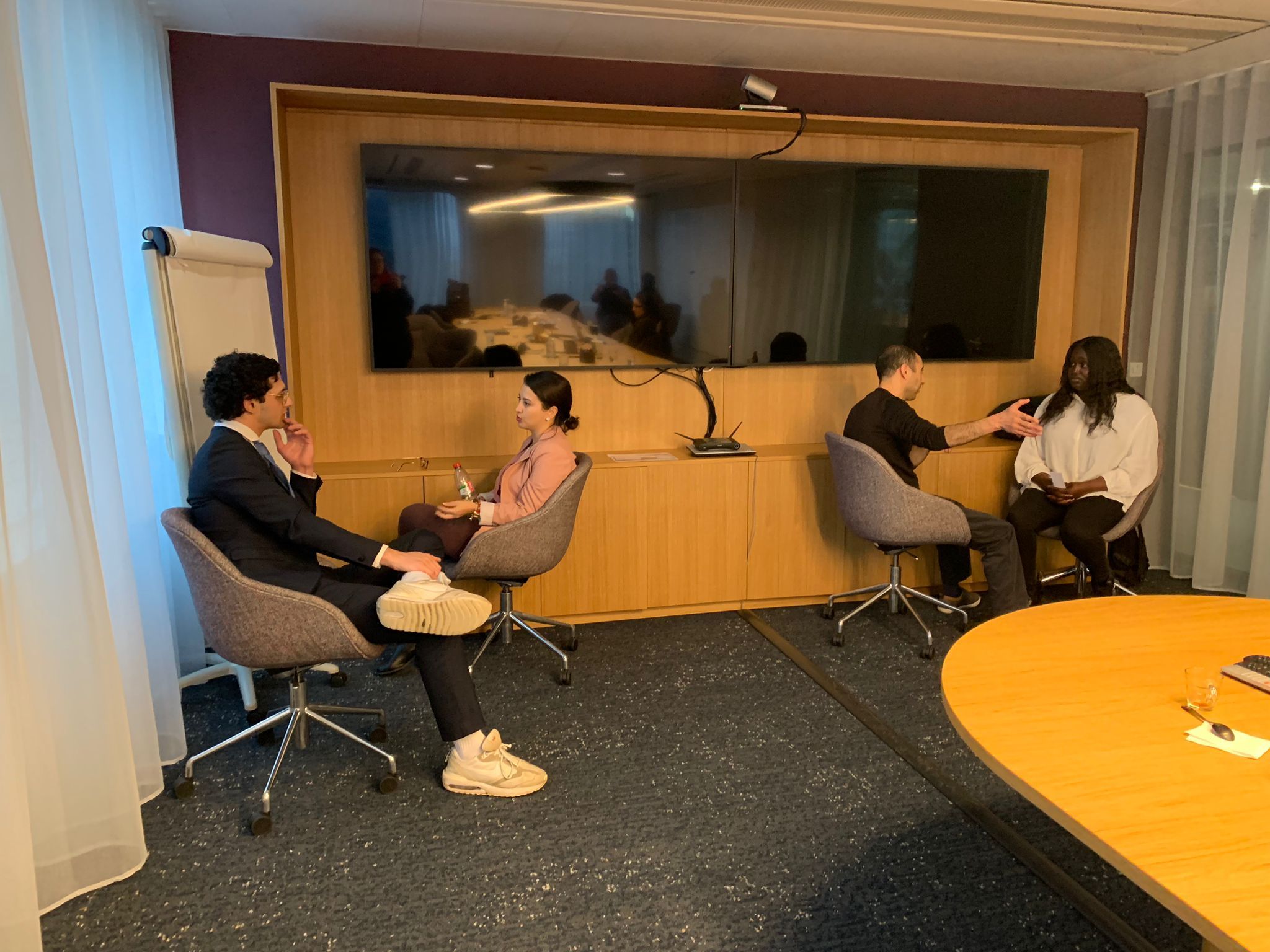 a group of people sitting in chairs