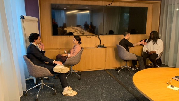 a group of people sitting in chairs