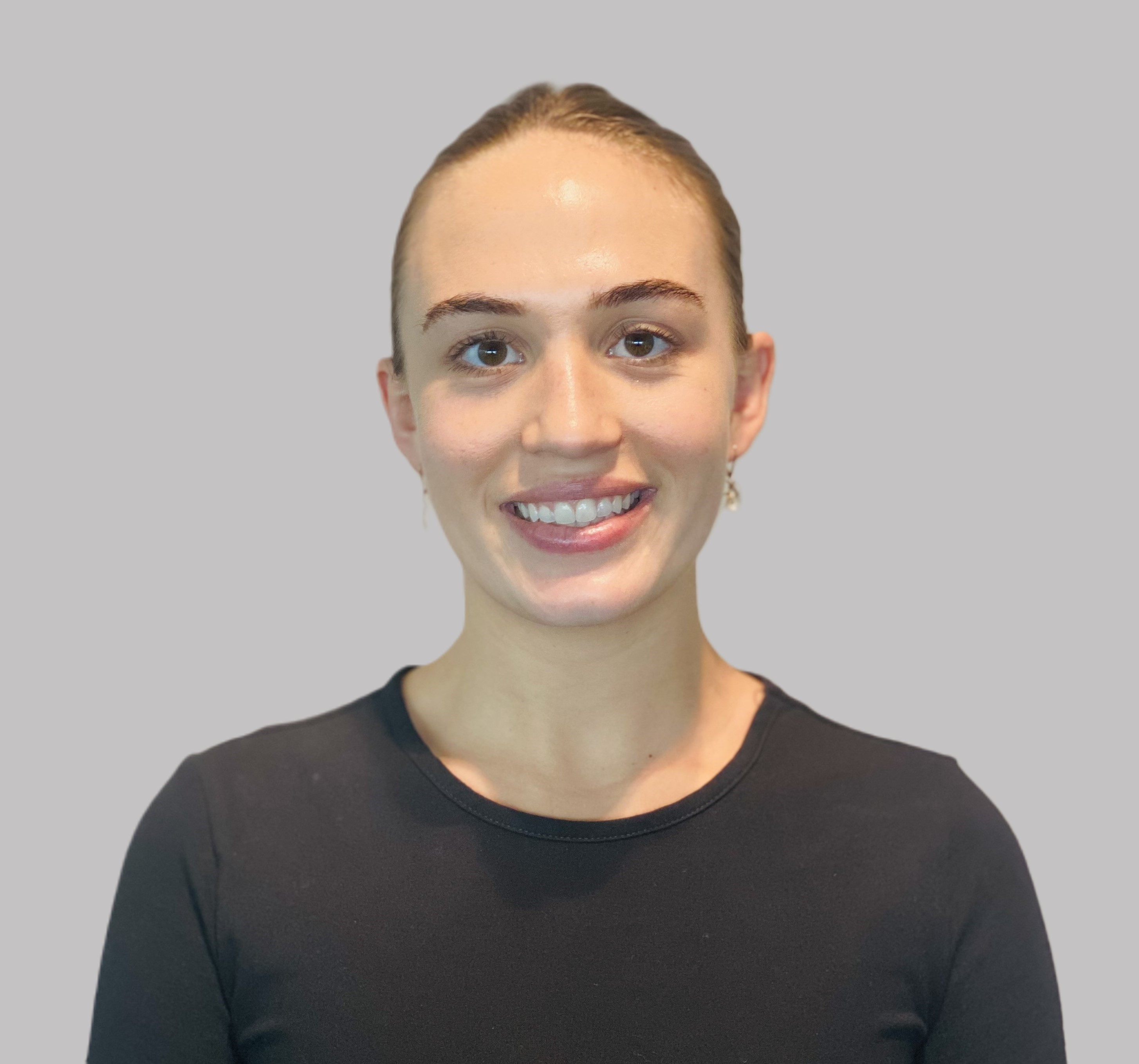 a person smiling at the camera