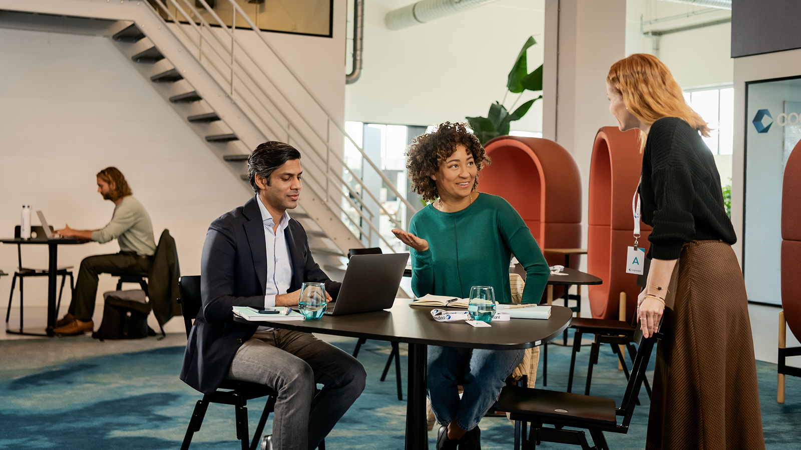 a group of people sitting at a table