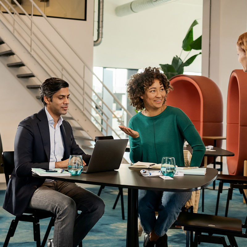 a group of people sitting at a table