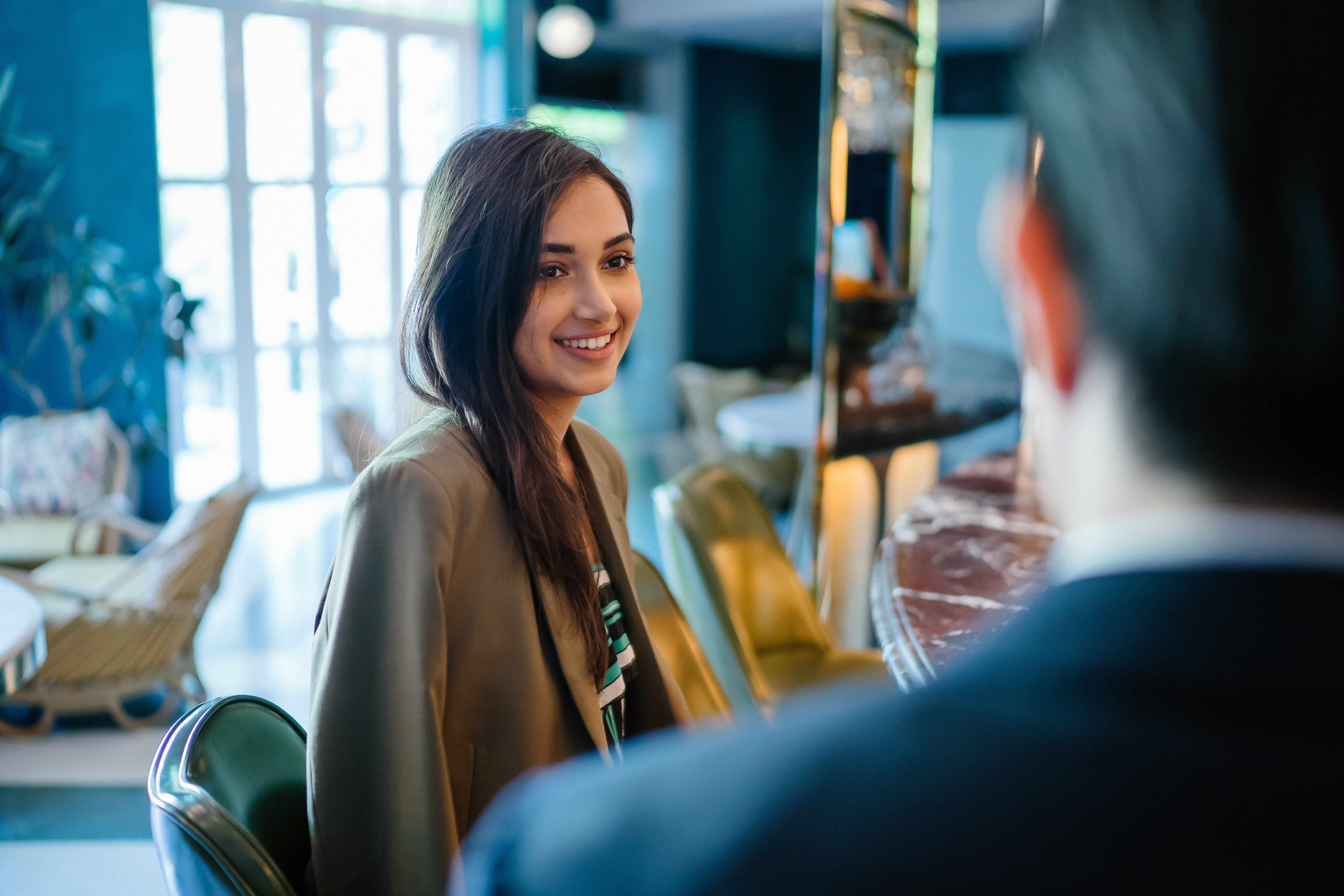 a person smiling at a person