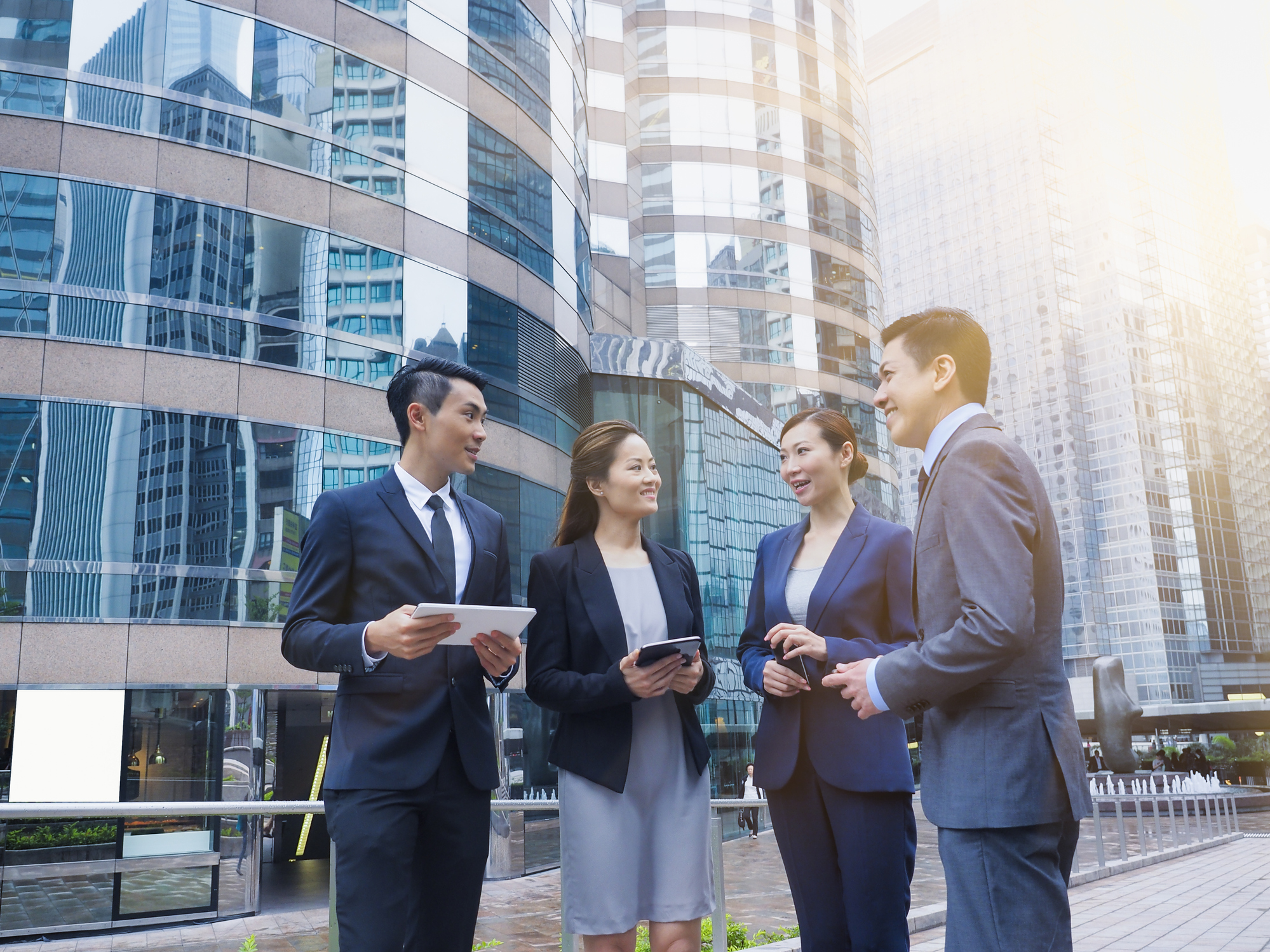 a group of people standing outside a building