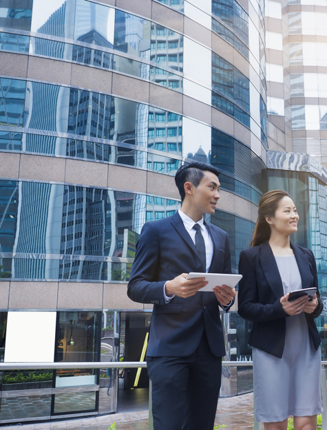 a group of people standing outside a building